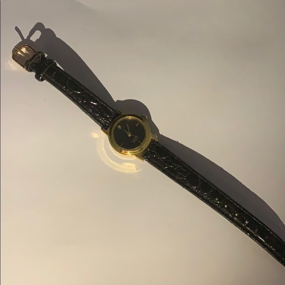 Thin black watch.